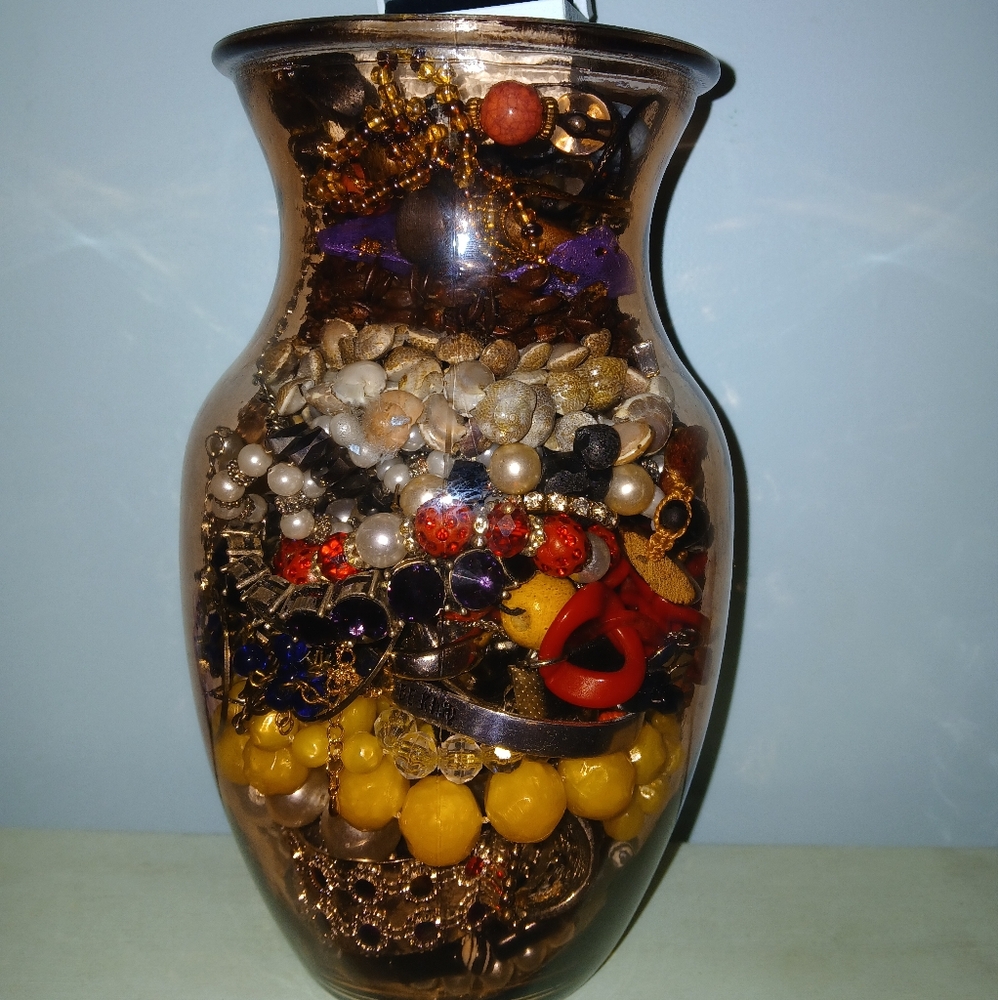 Colorful Jewelry Assortment in Glass Vase